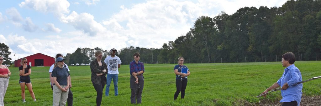 Students studying soil science