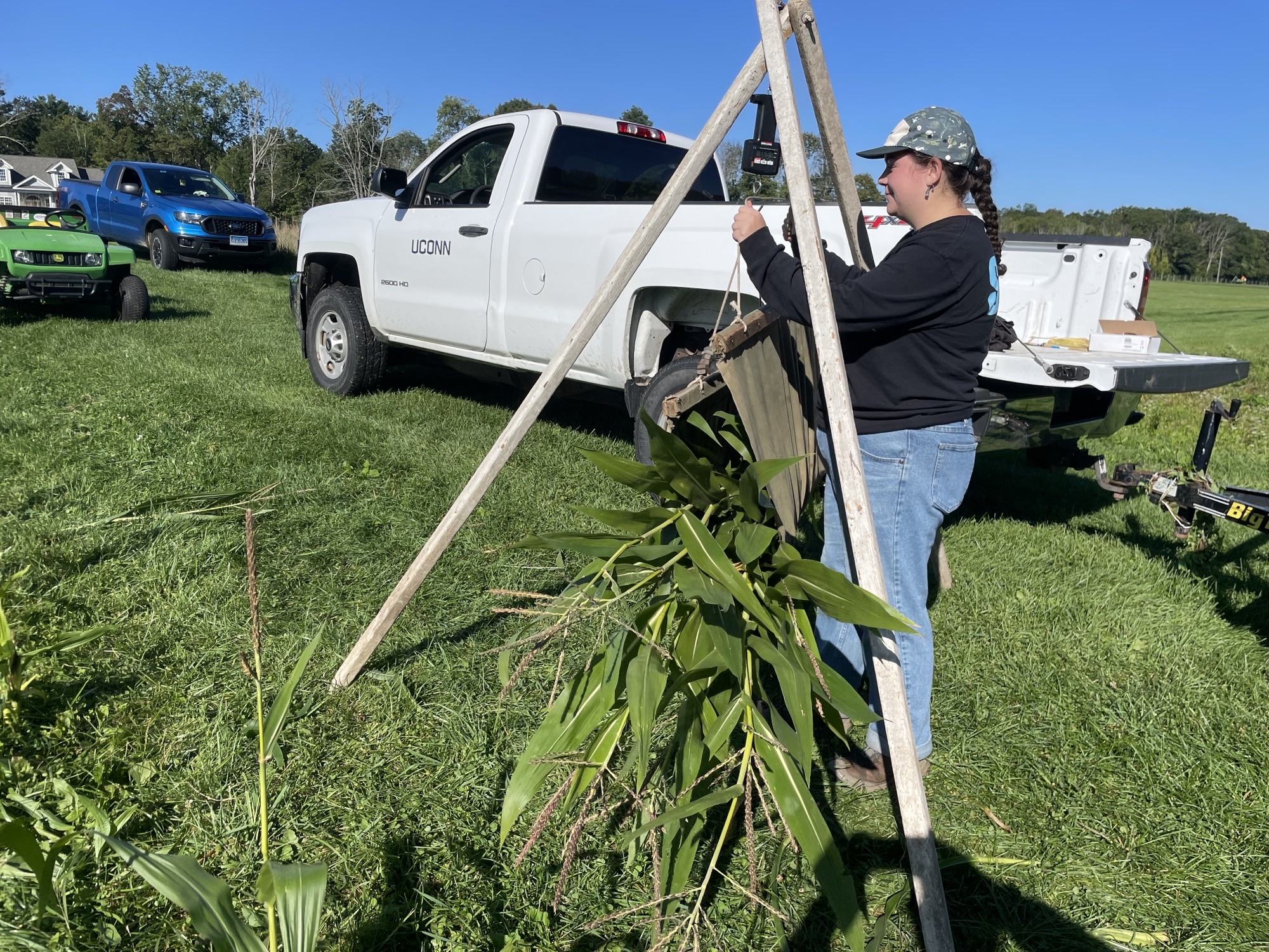 Student working in research farm. 